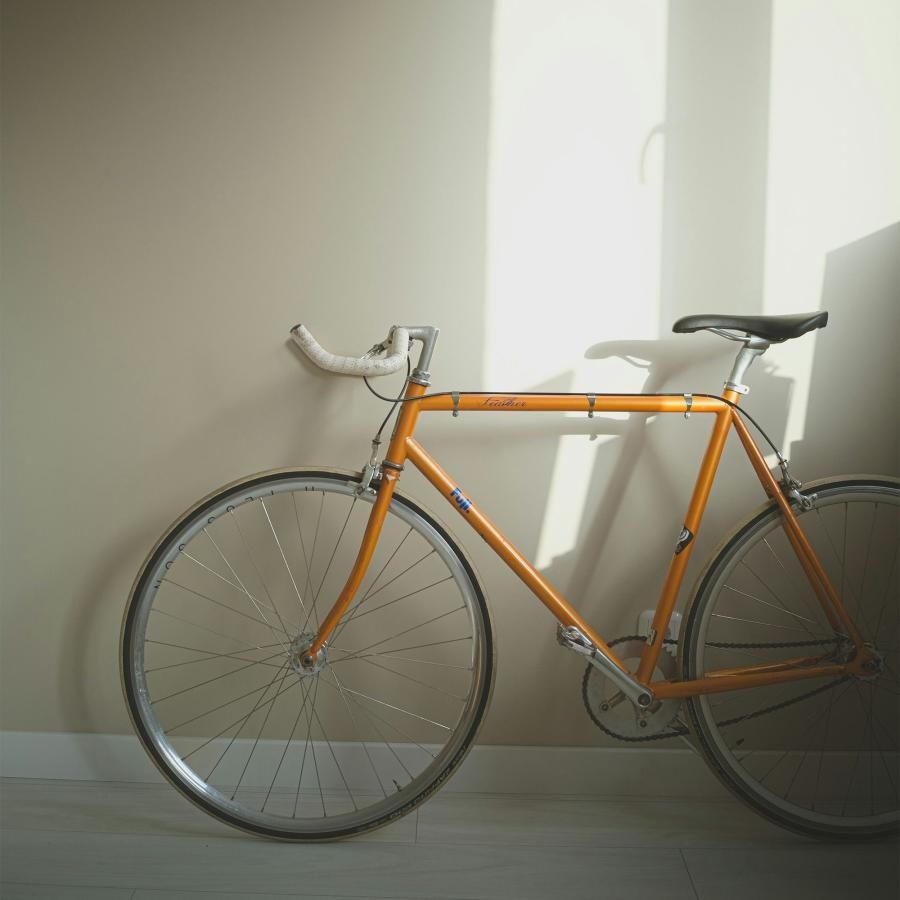 a bicycle parked in a room